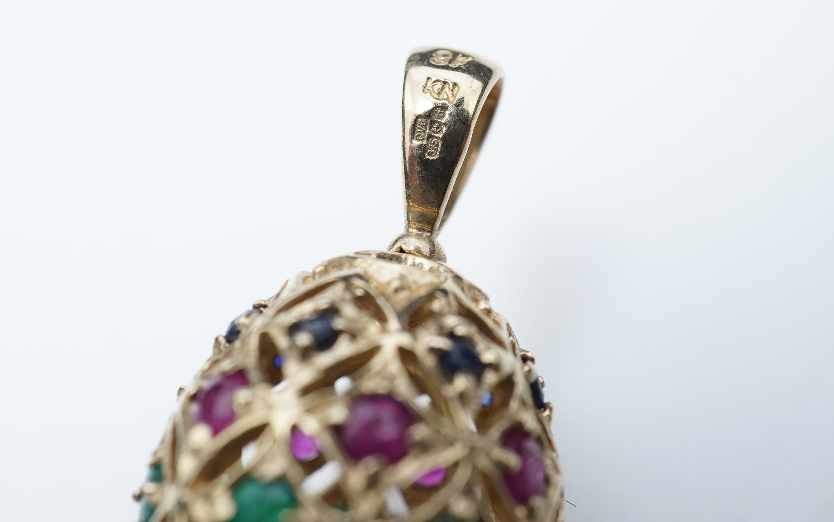 A gem-set egg pendant and an Edwardian seed pearl pendant